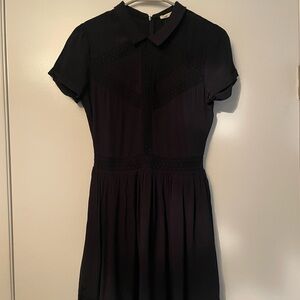 Maje black A-line mini dress, with crochet detail
